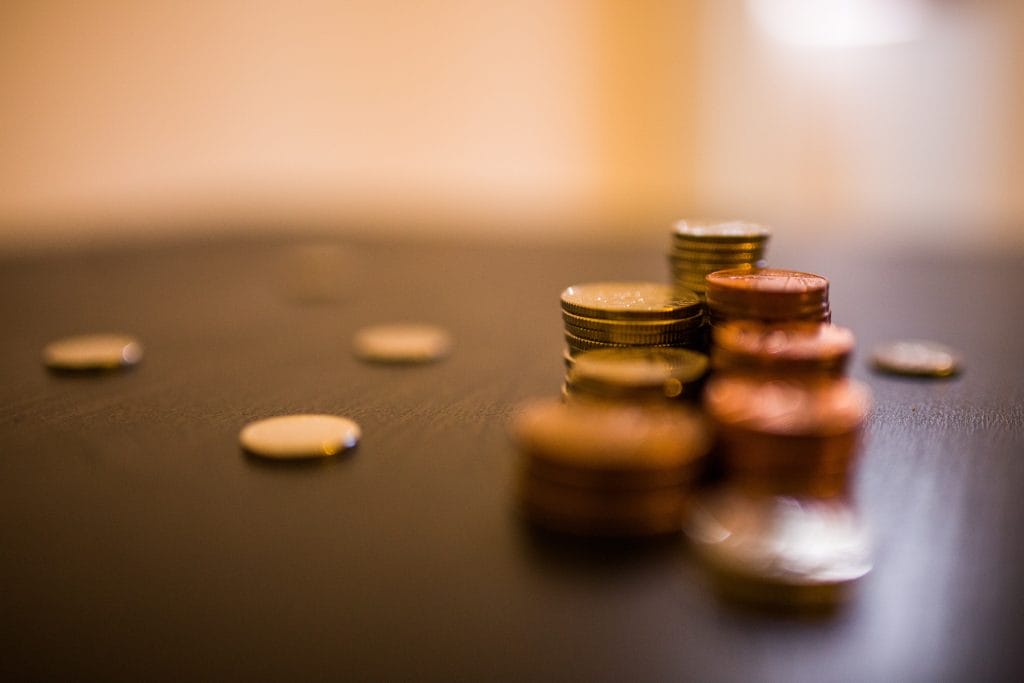Stacks of coins representing savings and credit.