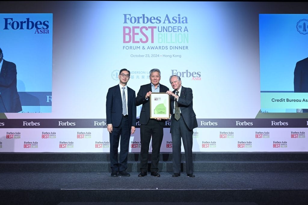 Credit Bureau Asia's leadership team accepts the Forbes Asia's Best Under a Billion award.