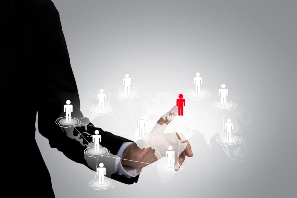 Executive touching icon social network